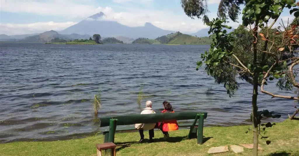 A couple enjoying an amazing view at Lake Mutanda